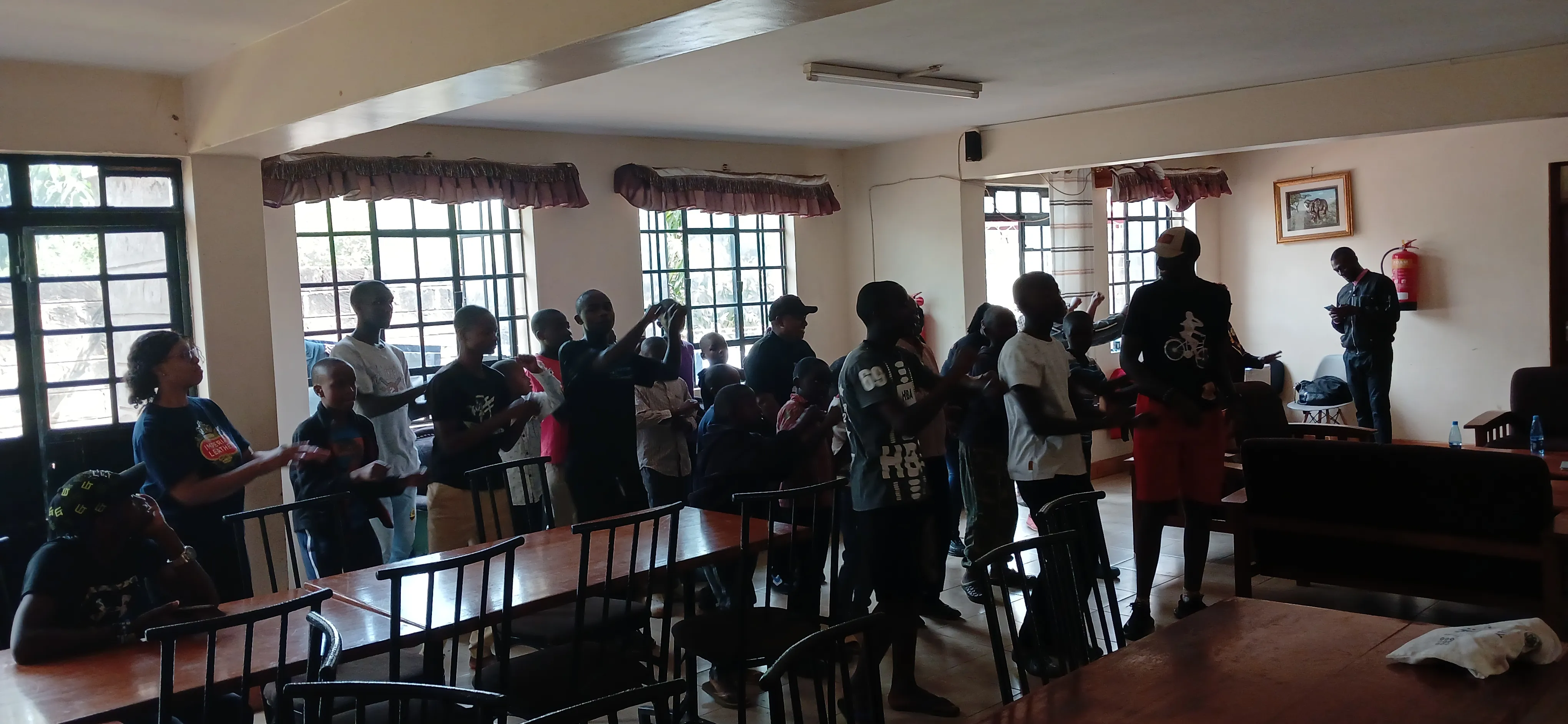 A group gathered for an activity at the home